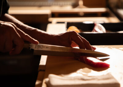 Edo-style sushi craftsmanship – chef preparing nigiri by hand at Sushi Shutatsu in Tokyo