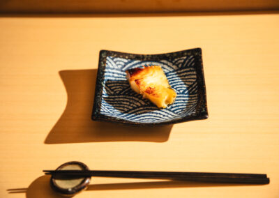 Grilled black cod served on a traditional Japanese dish at Sushi Shutatsu in Ogikubo.