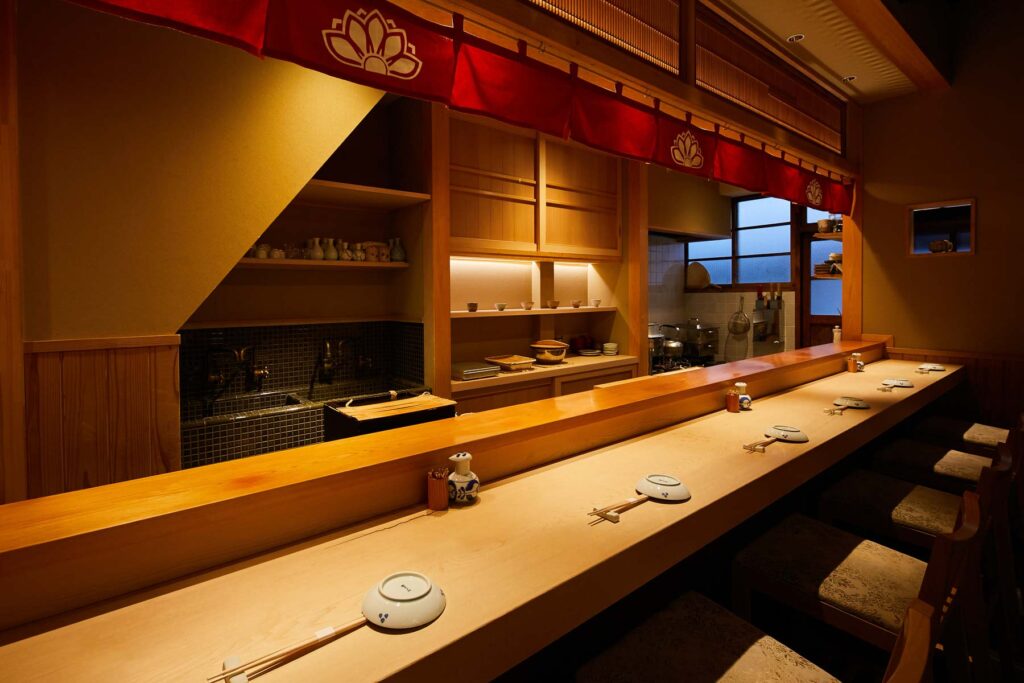 Traditional Japanese sushi counter showing authentic sushi dining culture in Japan